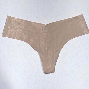 Victoria Secret beige glitter thong size: XS